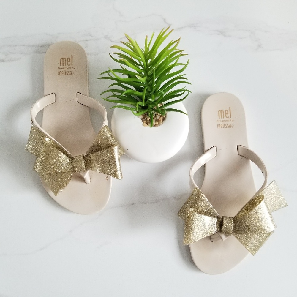 MEL by MELISSA Harmonic Gold Bow III Flip Flops - Picture 1 of 11